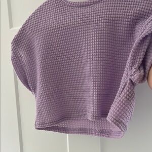 purple ribbed woman’s top